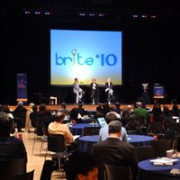 Image of panel and audience in conference room at Brite conference
