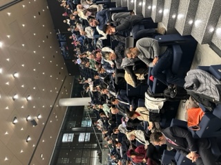 The audience listens