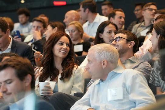 Students sitting in event crowd
