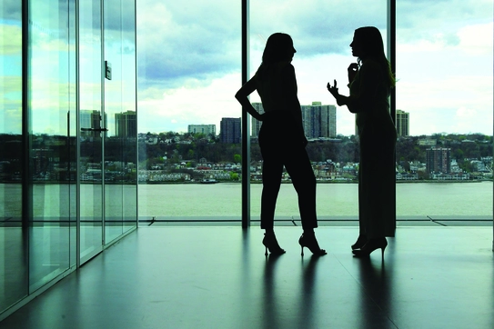 Catie Auran '22 and Rachel Lieberberg '22, graduating co-presidents of Columbia Women in Business, in the Board Room in David Geffen Hall. 