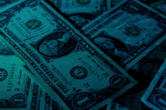 U.S. dollar banknote. Photo by Aidan Bartos on Unsplash.