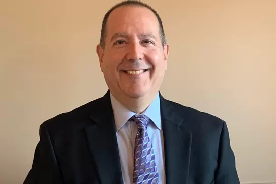Author David M. Schizer smiles