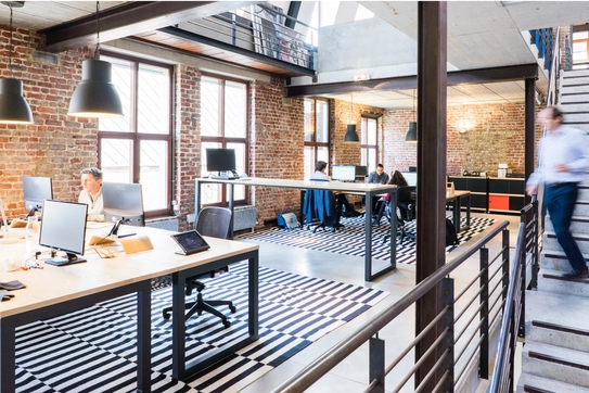 A photograph of an open plan office