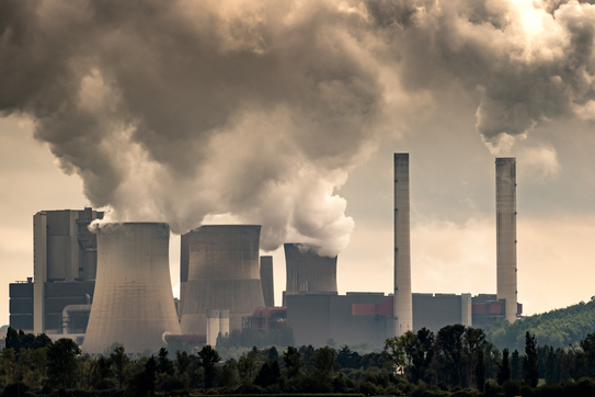 Industrial brown coal power plant chimney smokestack emissions