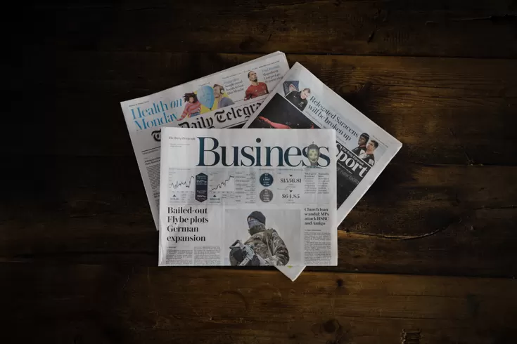 Business section of a newspaper. Photo by Annie Spratt on Unsplash.